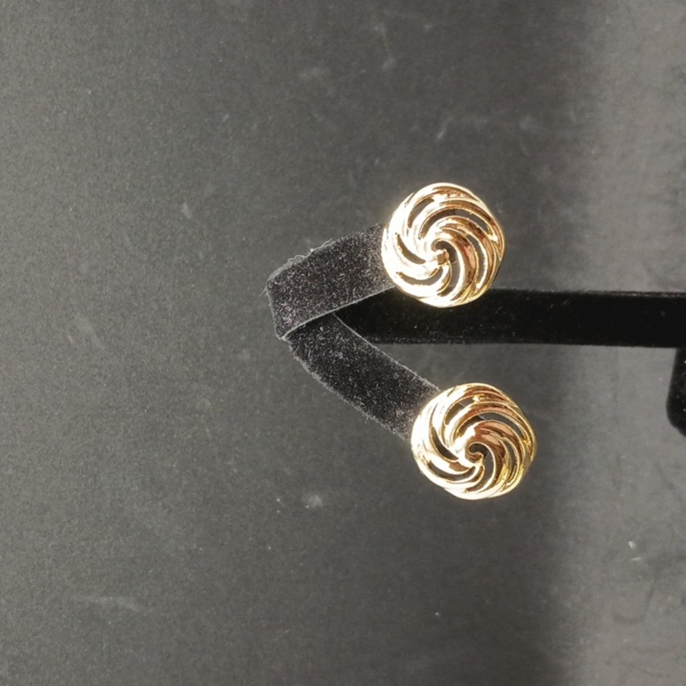 Vintage gold tone swirl stud earrings